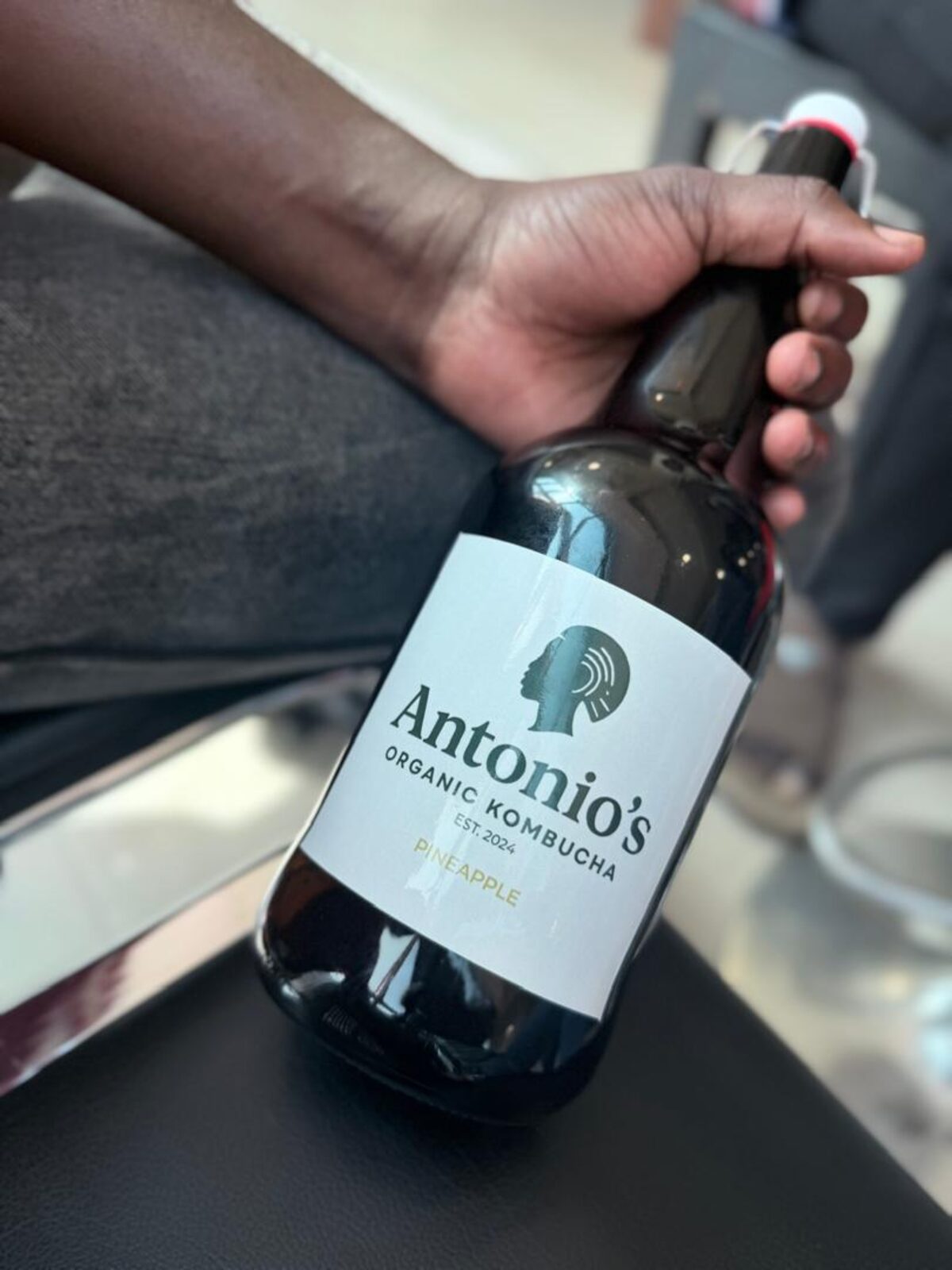Bottle of organic kombucha produced locally in Uganda